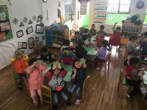 大隐镇二幼与泰达二幼携手开展“巧手包青团，传承清明情”民俗体验活动